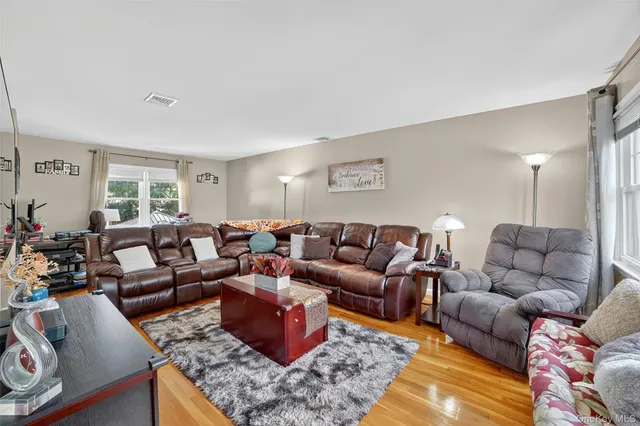 a living room with furniture and a couch