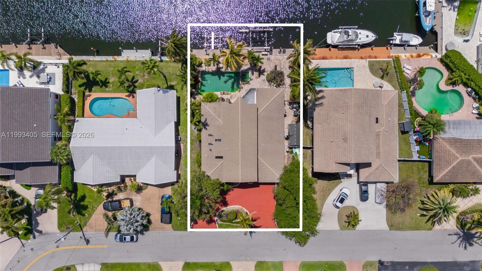 2858 Northeast 33rd Street Lighthouse Point, FL 33064 - Photo 24 of 24 an aerial view of residential house with outdoor space and swimming pool