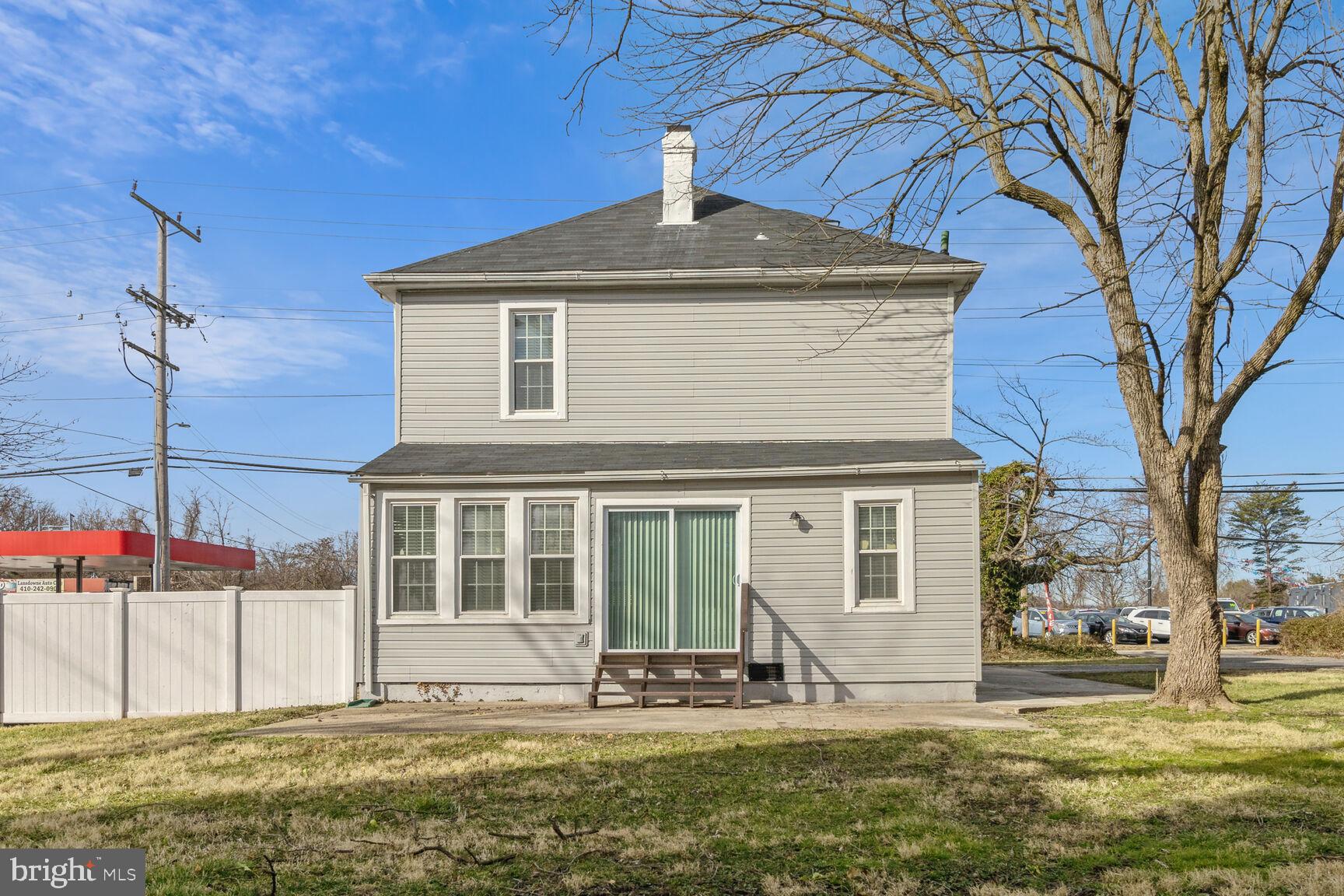 2807 Hammonds Ferry Road Halethorpe, MD 21227 - Photo 22 of 23 Rear exterior, w/ slider entrance to Sunroom