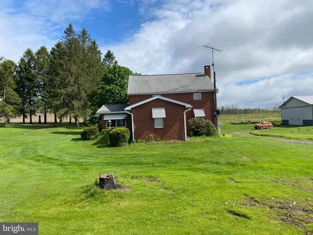 a house view with a outdoor space