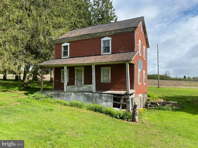 a room with furniture and a window