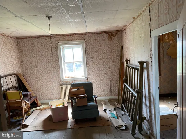 a view of a swimming pool with a yard