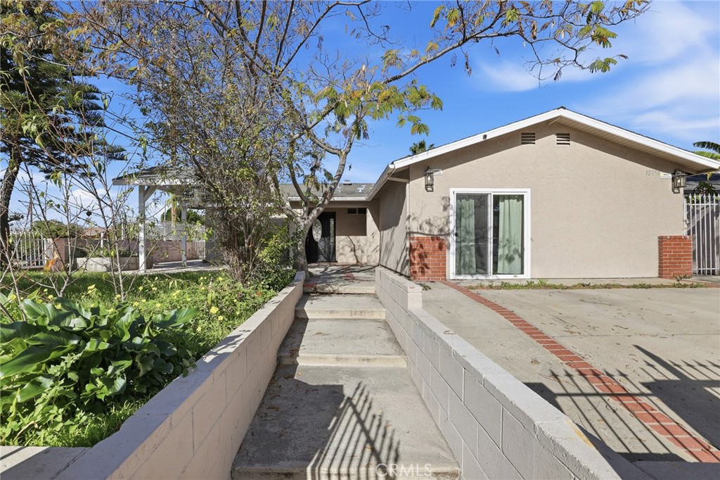 12755 Judd Street Pacoima, CA 91331 - Photo 1 of 1 a view of a house with a yard