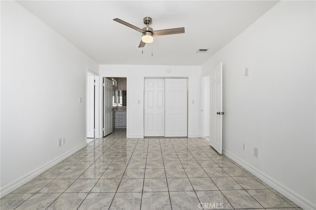 12755 Judd Street Pacoima, CA 91331 - Photo 25 of 46 a view of a hallway with a chandelier fan