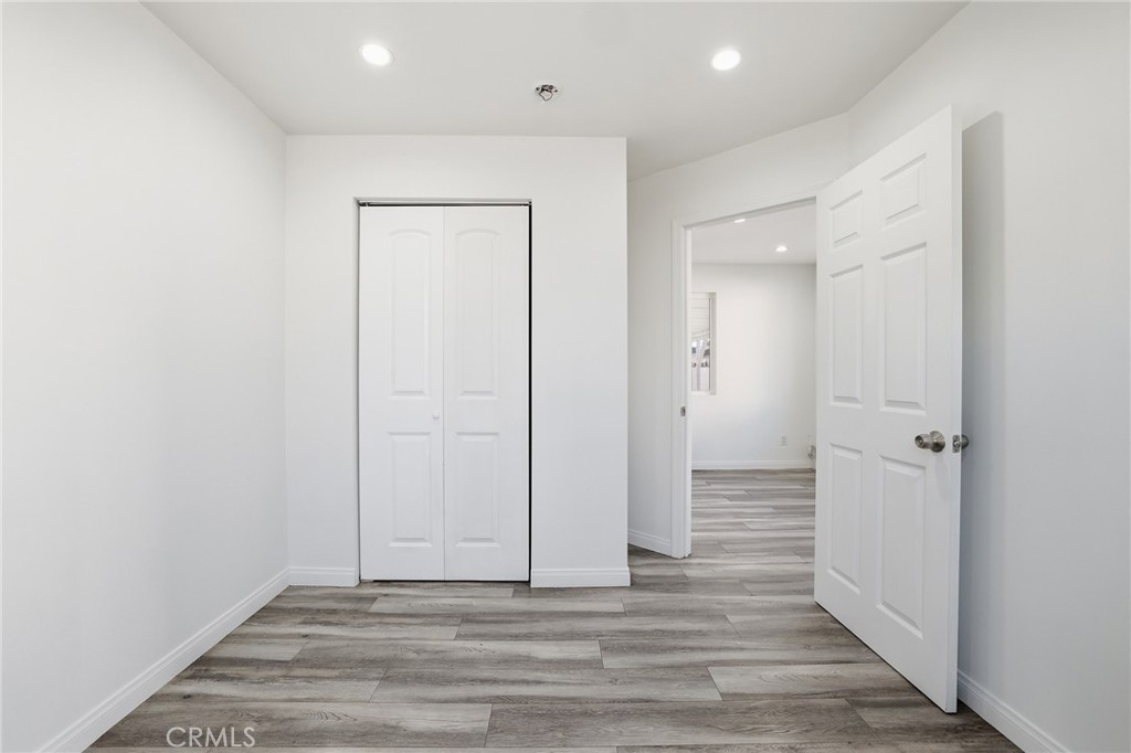 12755 Judd Street Pacoima, CA 91331 - Photo 34 of 46 a view of hallway with wooden floor