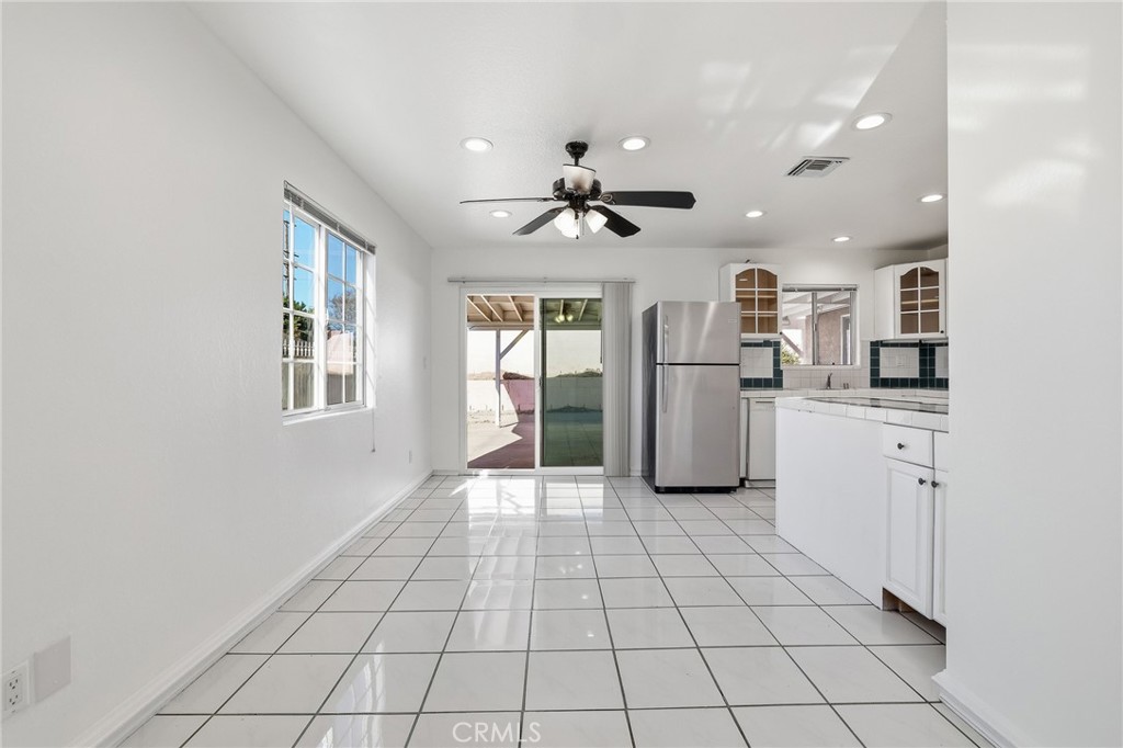 12755 Judd Street Pacoima, CA 91331 - Photo 4 of 46 a view of a kitchen with refrigerator and microwave