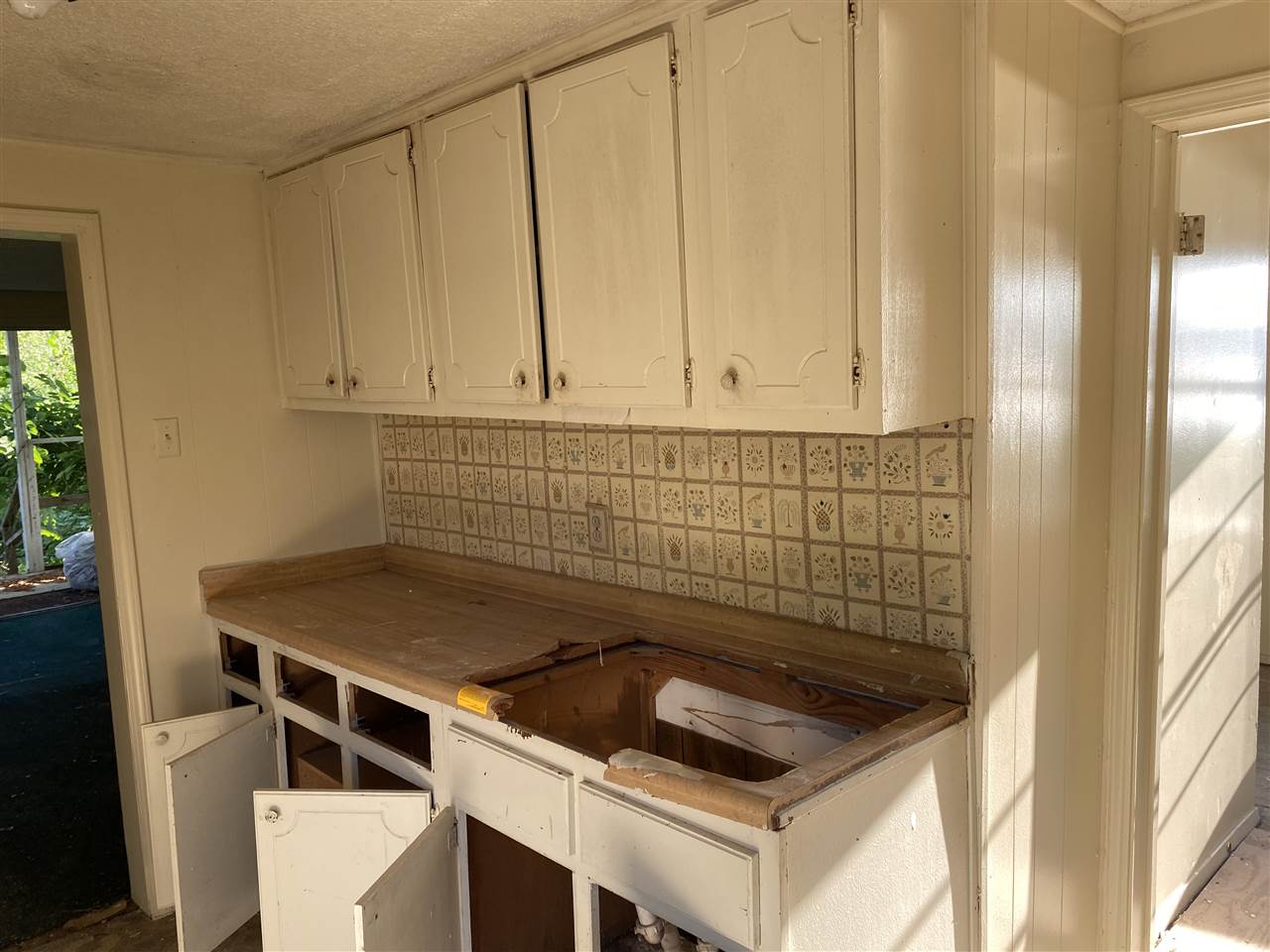 1486 Longcrest Road Memphis, TN 38109 - Photo 10 of 25 a bathroom with a sink a window and a shower