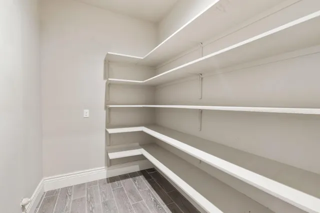 a view of an empty walk in closet