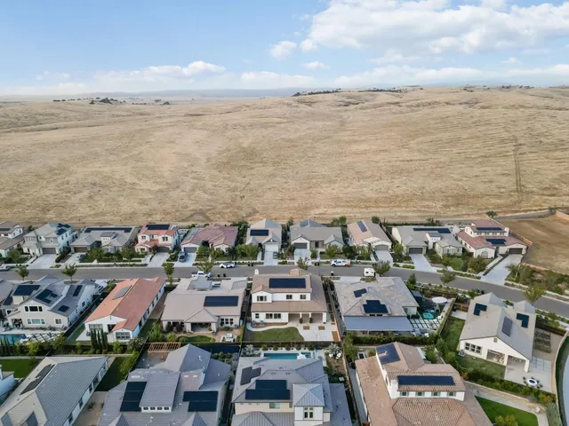 an aerial view of beach and ocean