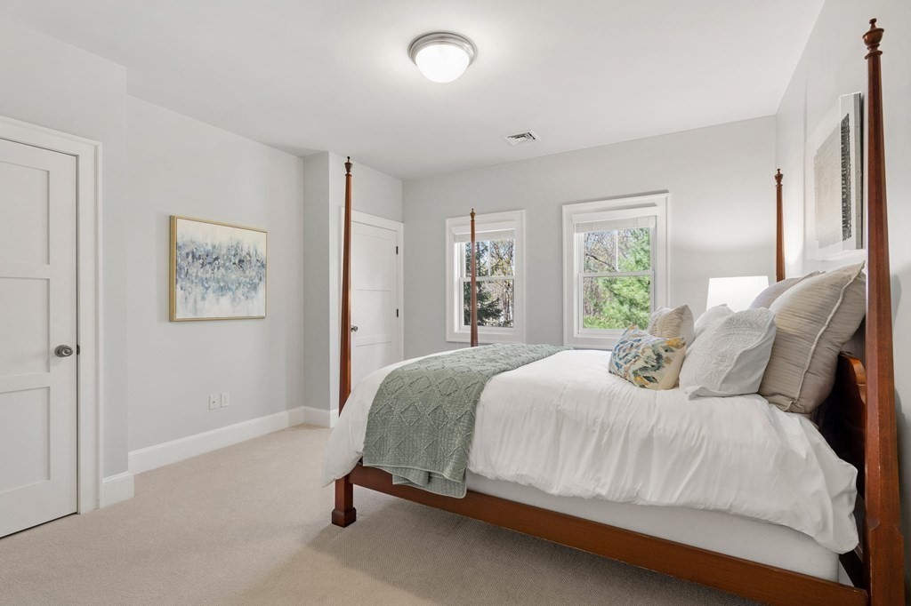 11 Wenham Road Newton, MA 02461 - Photo 14 of 19 a bedroom with a bed and a window