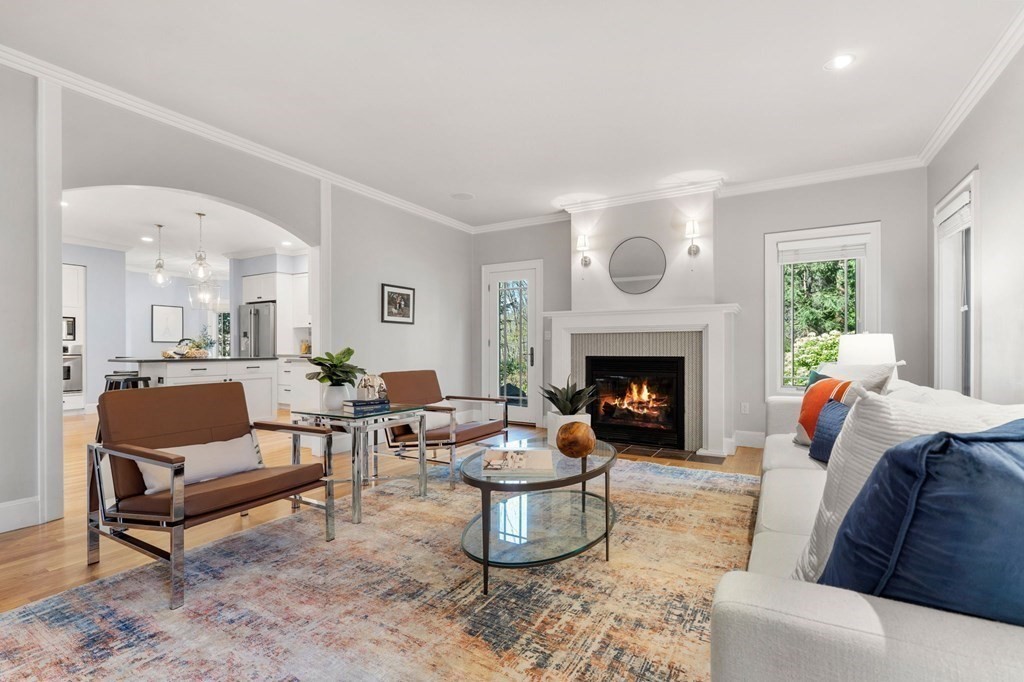 11 Wenham Road Newton, MA 02461 - Photo 7 of 19 a living room with furniture and a fireplace