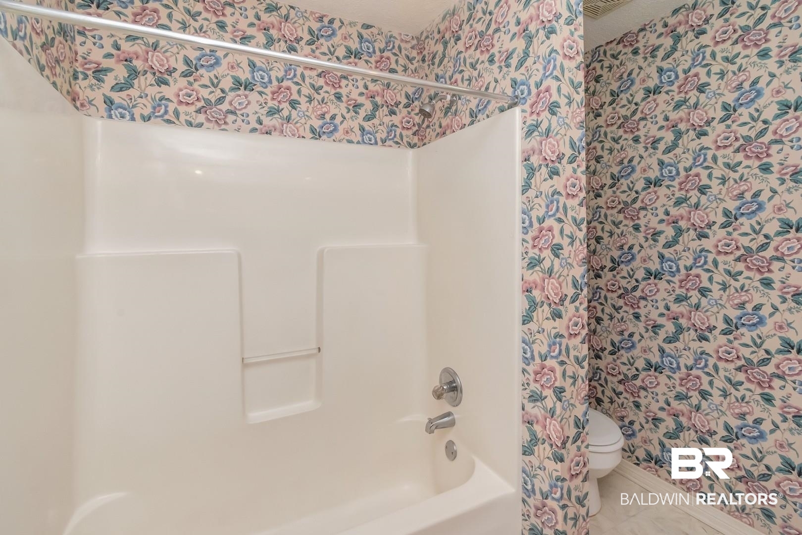 1345 Camden Court Mobile, AL 36695 - Photo 10 of 31 Bathroom featuring shower / bath combination with curtain and wallpapered walls