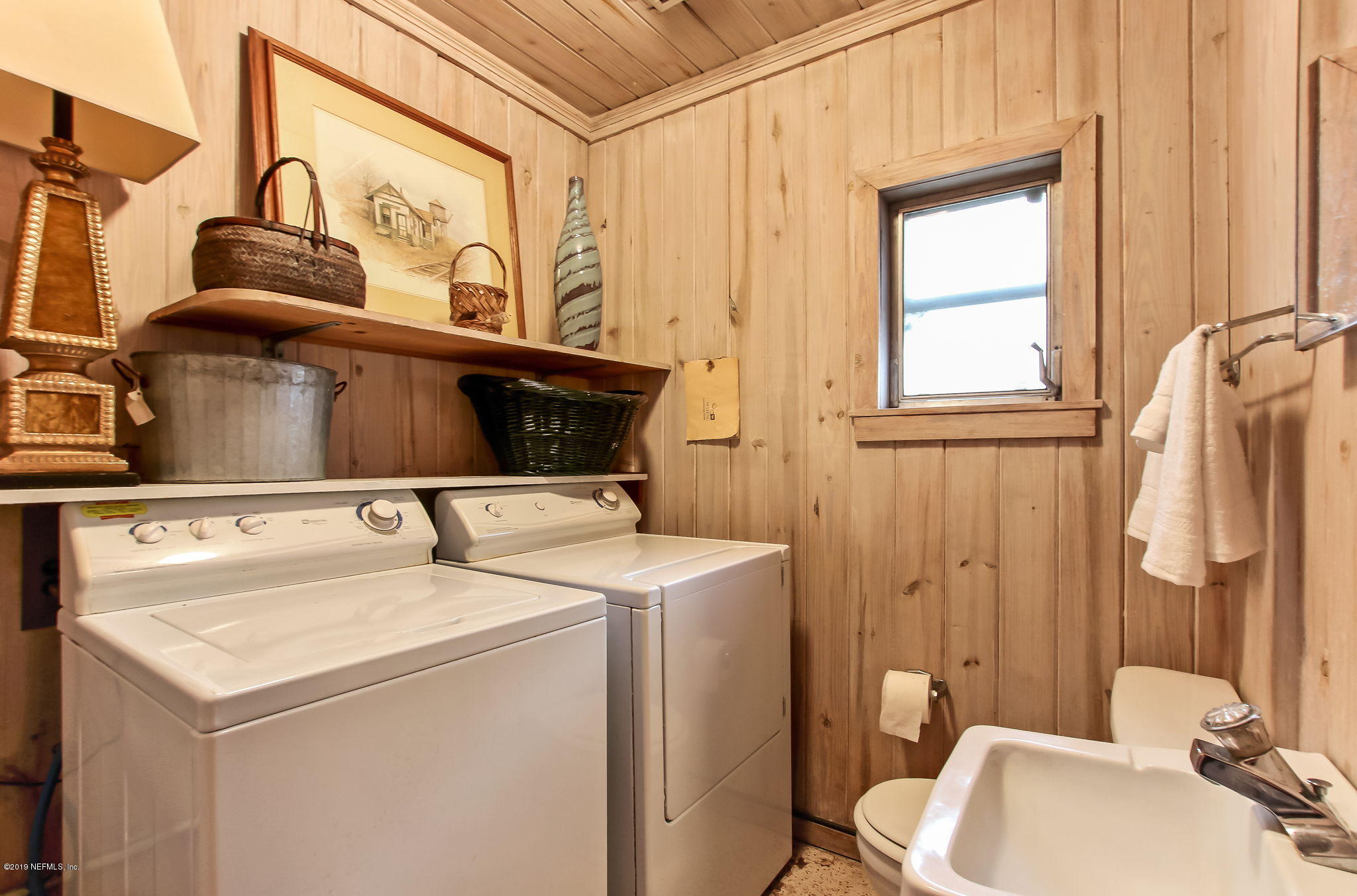 4112 Timuquana Road Jacksonville, FL 32244 - Photo 34 of 39 Laundry Room with half bath