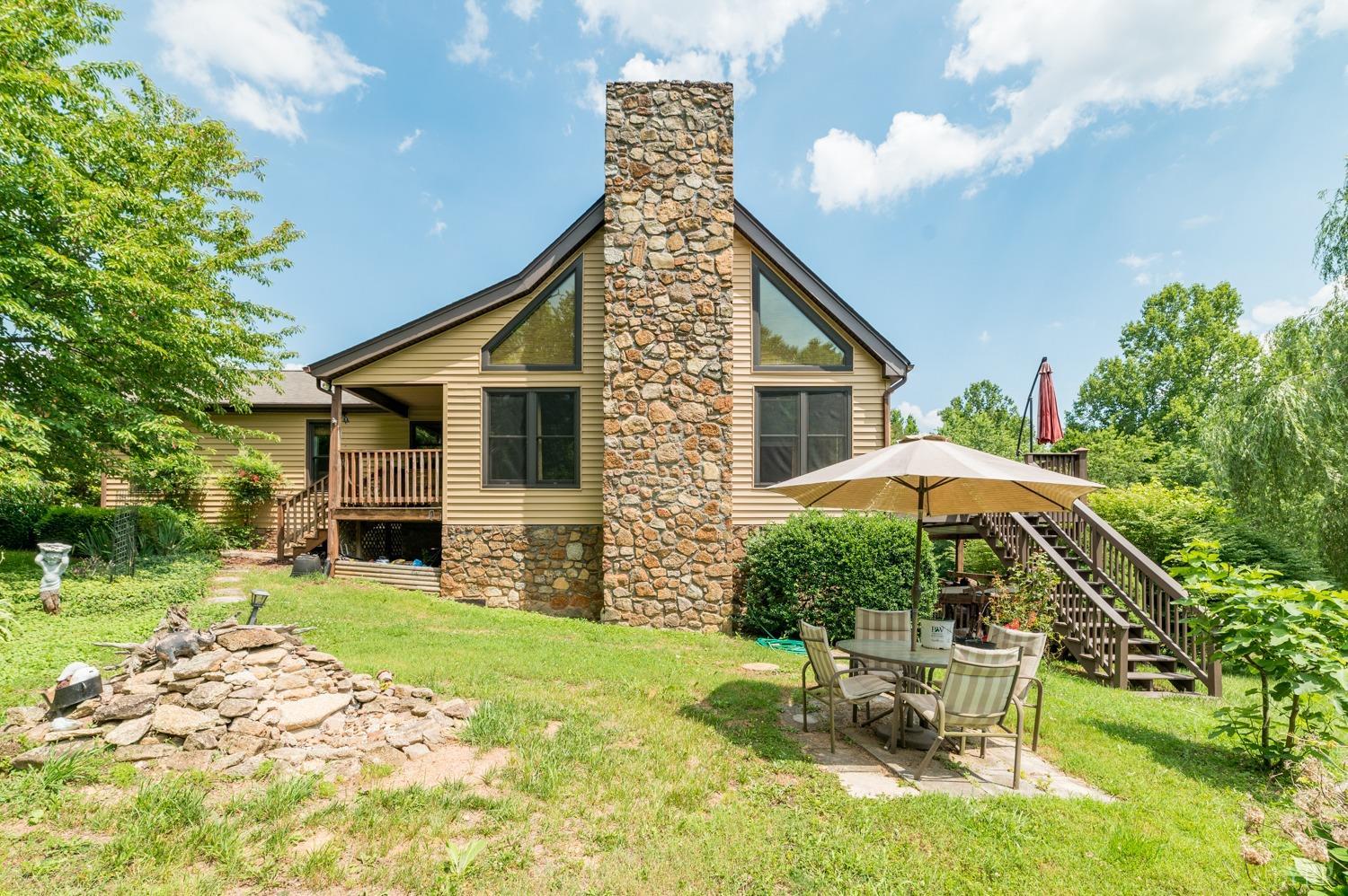1796 Union Church Road Thaxton, VA 24174 - Photo 1 of 83 a view of a house with backyard porch and sitting area