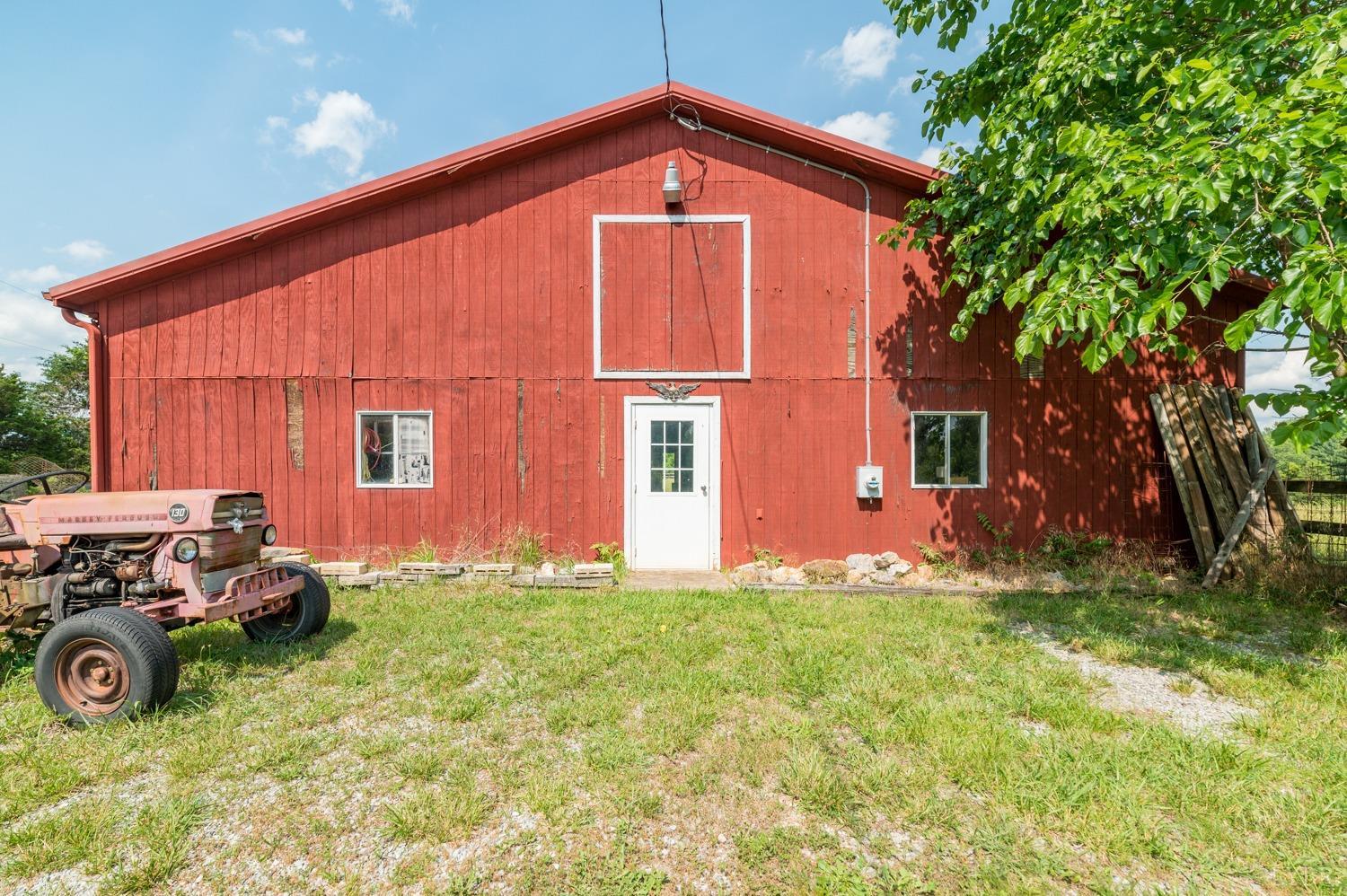1796 Union Church Road Thaxton, VA 24174 - Photo 15 of 83 a front view of a house with a garden and parking space