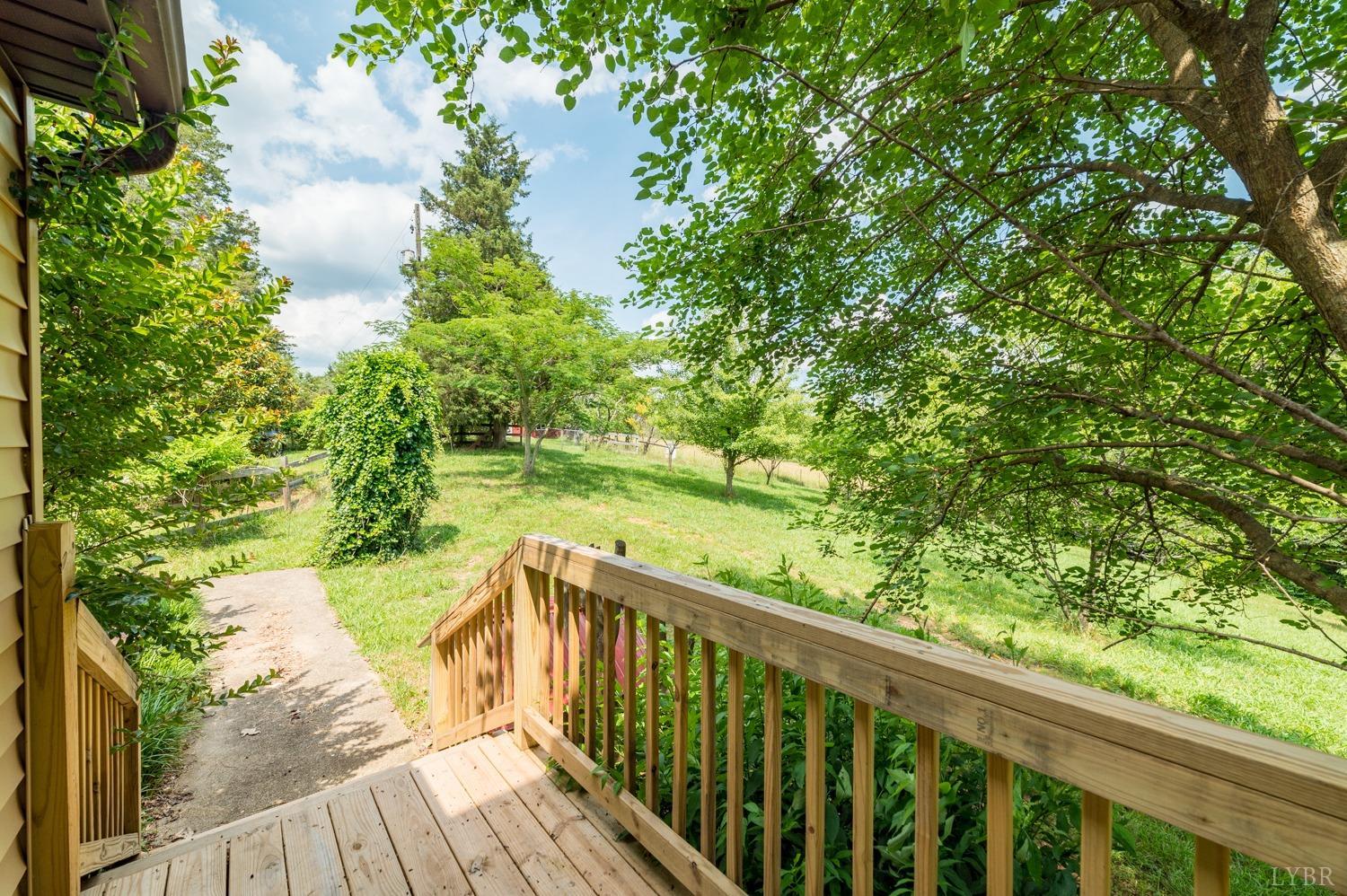 1796 Union Church Road Thaxton, VA 24174 - Photo 36 of 83 a balcony with trees in front of it