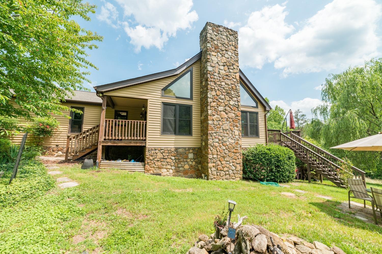 1796 Union Church Road Thaxton, VA 24174 - Photo 4 of 83 a view of a house with backyard and sitting area