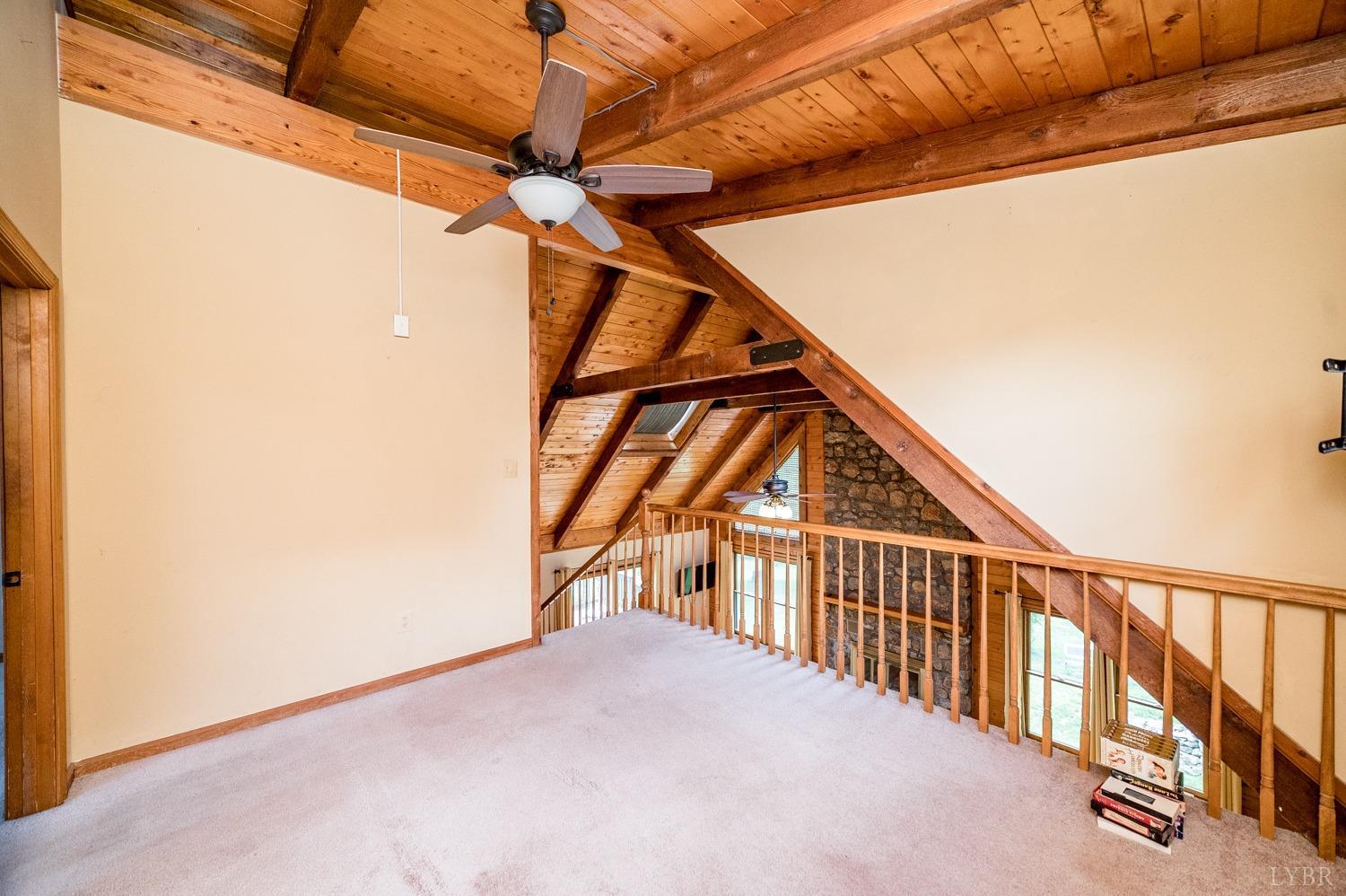 1796 Union Church Road Thaxton, VA 24174 - Photo 55 of 83 a view of staircase with a white walls and a window