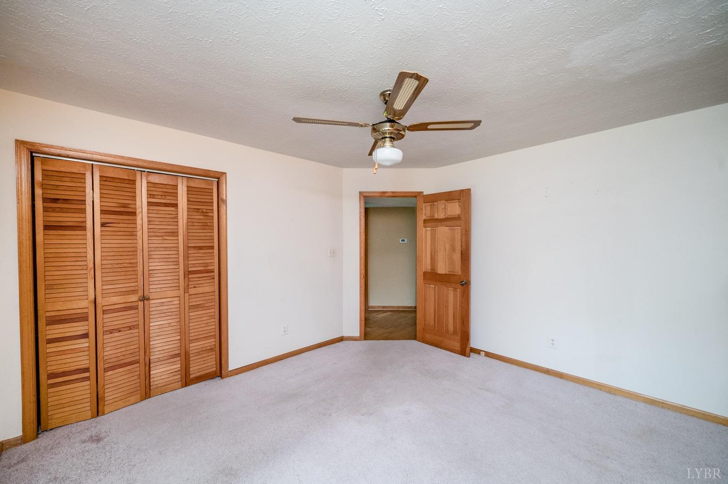 1796 Union Church Road Thaxton, VA 24174 - Photo 57 of 83 a view of livingroom with furniture and ceiling fan