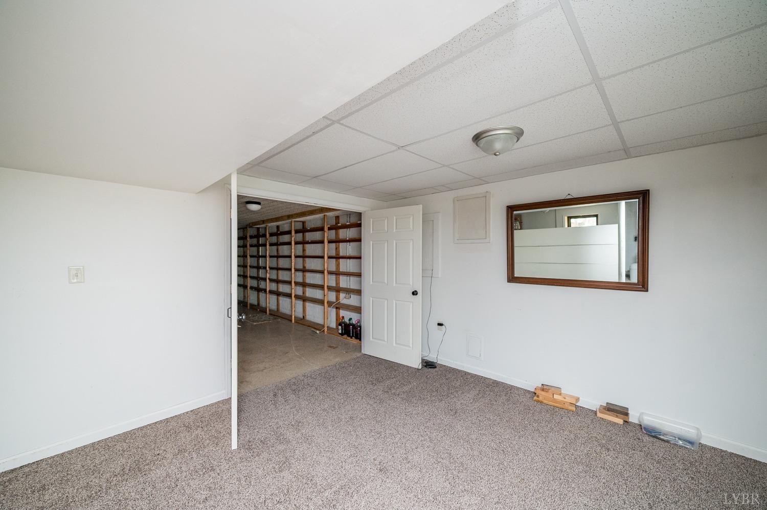 1796 Union Church Road Thaxton, VA 24174 - Photo 66 of 83 a view of an empty room with a ceiling fan