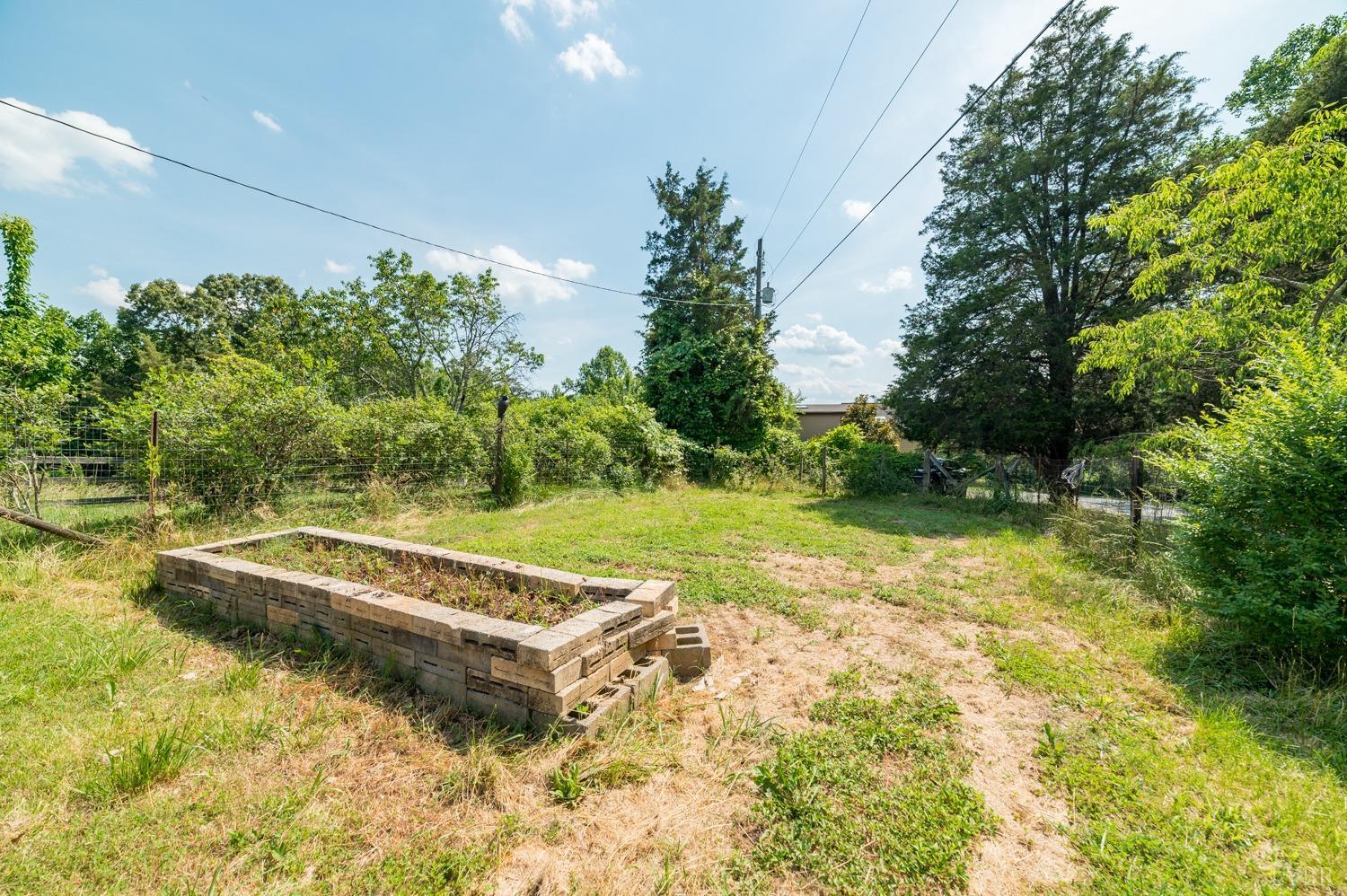 1796 Union Church Road Thaxton, VA 24174 - Photo 77 of 83 a view of a swimming pool with a garden