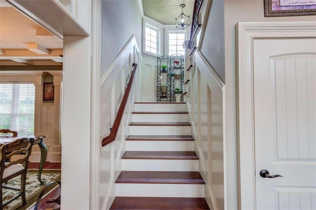 2008 Costley Mill Road Northeast Conyers, GA 30013 - Photo 19 of 55 a view of staircase with wooden floor and stairs