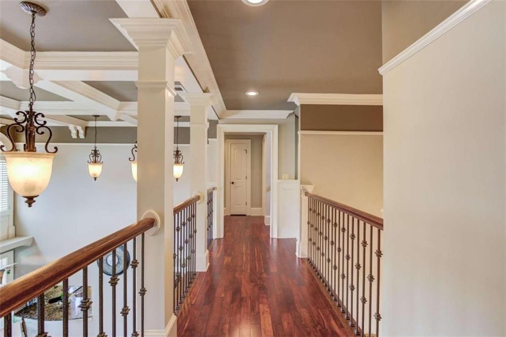 2008 Costley Mill Road Northeast Conyers, GA 30013 - Photo 20 of 55 a view of a hallway with wooden floor