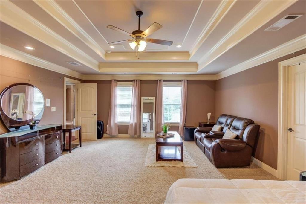 2008 Costley Mill Road Northeast Conyers, GA 30013 - Photo 22 of 55 a living room with furniture and a large window