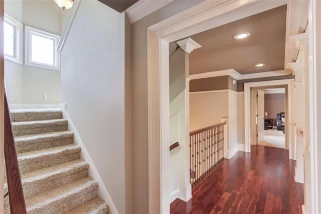 a living room with furniture and a piano