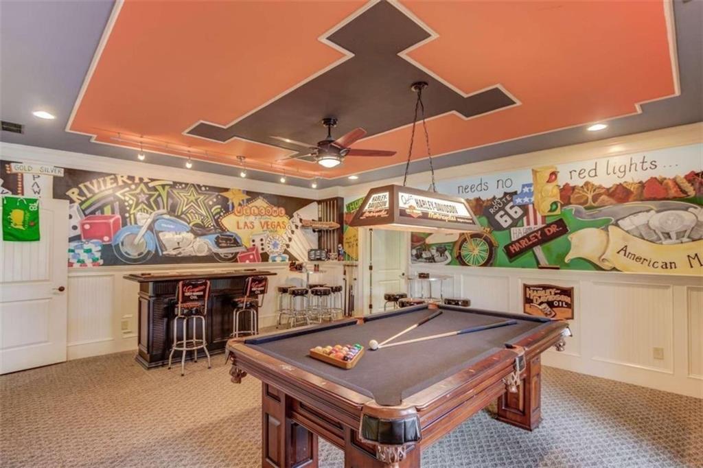 2008 Costley Mill Road Northeast Conyers, GA 30013 - Photo 28 of 55 a room with stainless steel appliances table and chairs