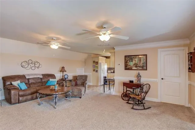 a kitchen with cabinets appliances a sink and a counter top space