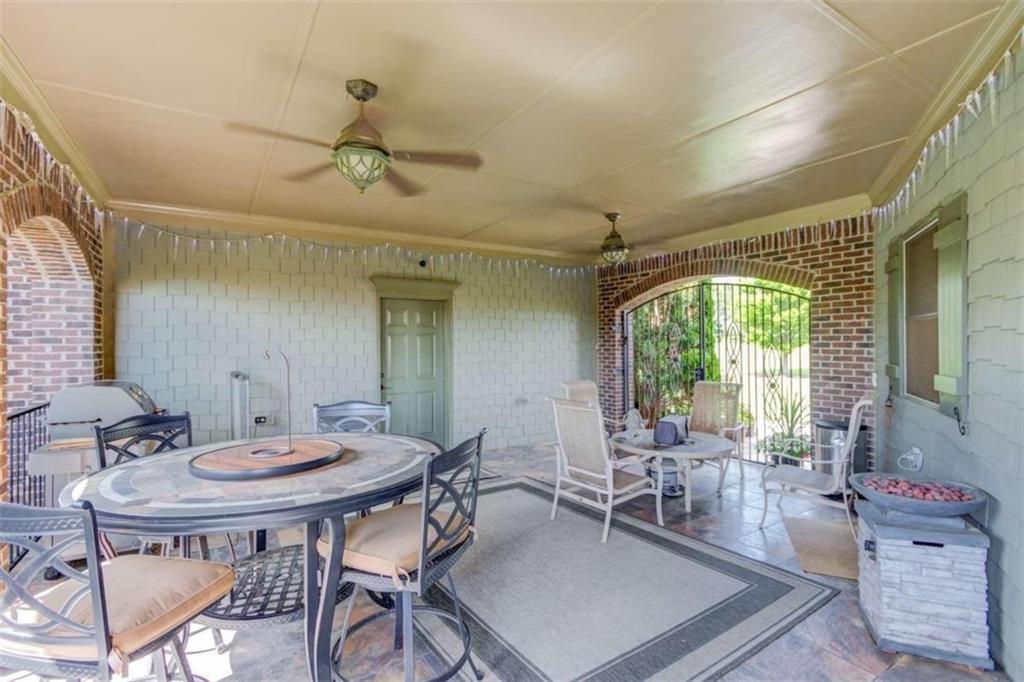 2008 Costley Mill Road Northeast Conyers, GA 30013 - Photo 42 of 55 a view of a dining room with furniture window and outside view