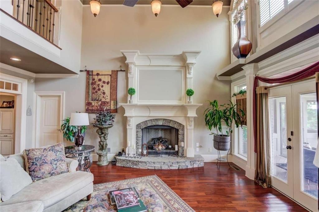 2008 Costley Mill Road Northeast Conyers, GA 30013 - Photo 8 of 55 a living room with furniture and a fireplace