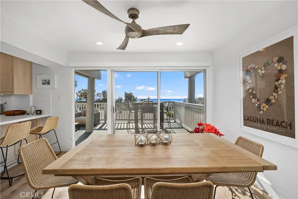 a bathroom with a sink a mirror and vanity
