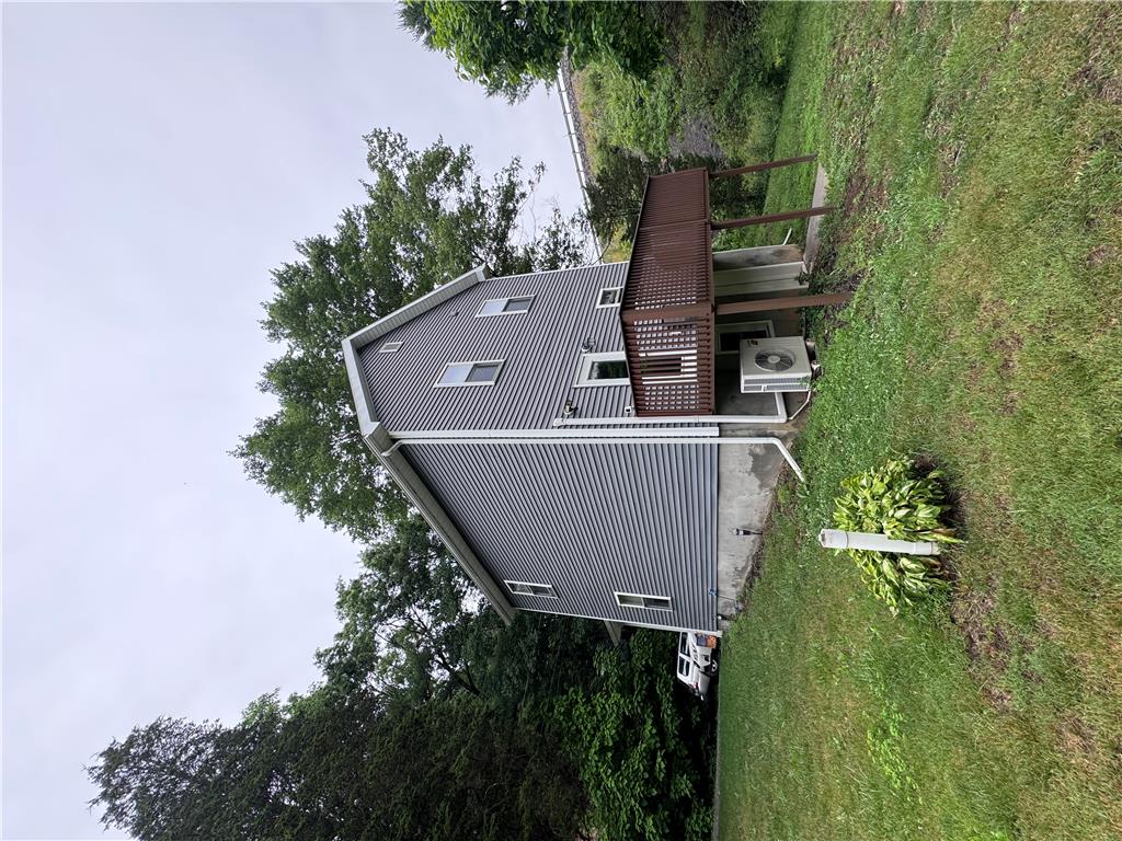 130 Hidden Spur Road Lehighton, PA 18235 - Photo 18 of 19 A well-maintained side exterior boasts durable siding and a generous deck for outdoor enjoyment.