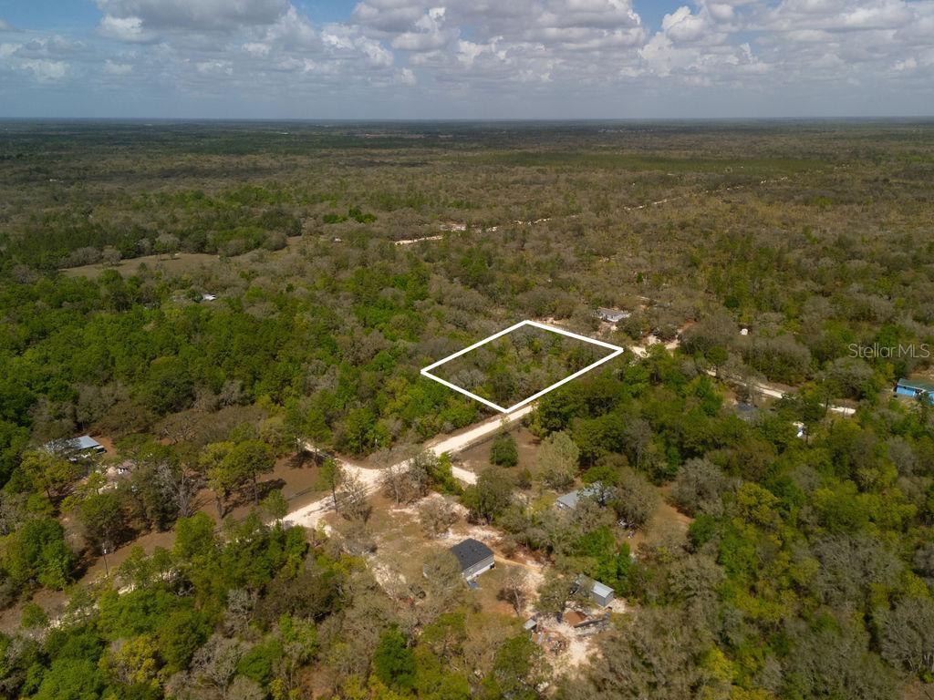 0 Northeast 131st Terrace Bronson, FL 32621 - Photo 3 of 24 a view of an ocean and beach
