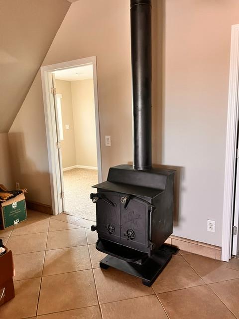3019 Lathrop Road Manteca, CA 95336 - Photo 27 of 43 a living room with a chair and a fireplace