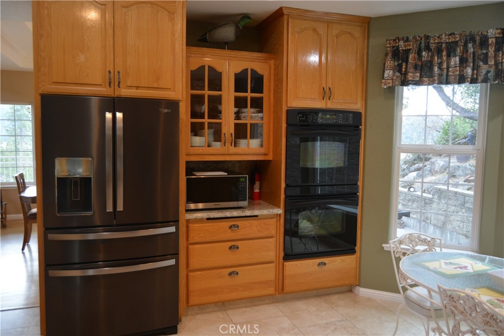 39818 Granite Ridge Lane Bass Lake, CA 93604 - Photo 2 of 29 a view of walk in closet with window