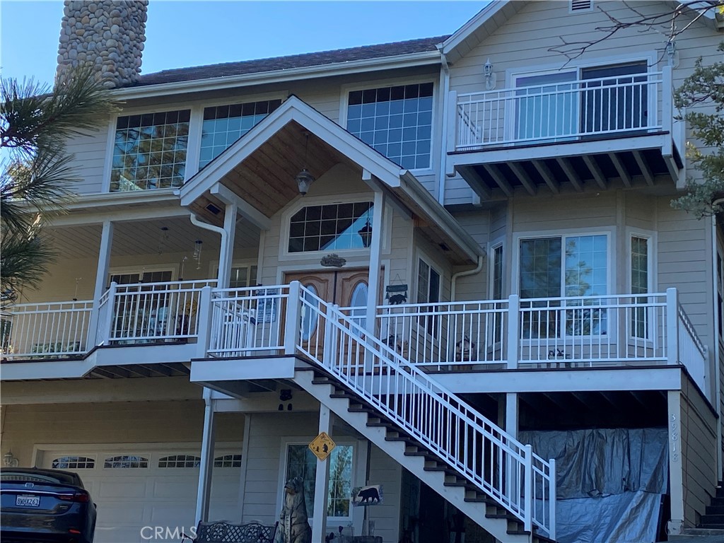 39818 Granite Ridge Lane Bass Lake, CA 93604 - Photo 28 of 29 a view of a house with a deck