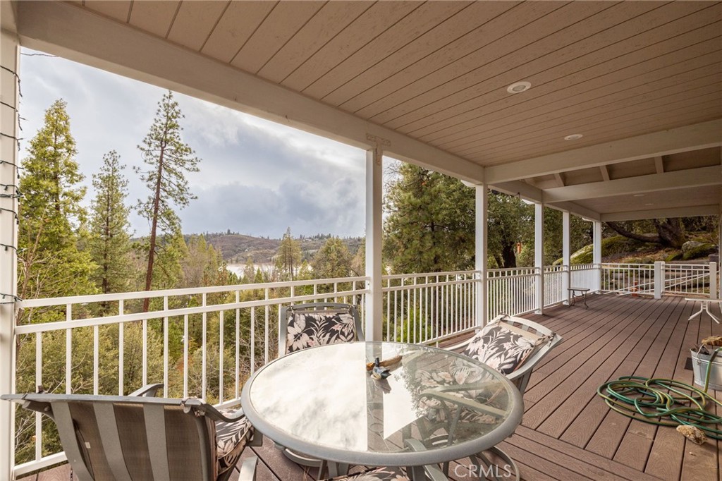 39818 Granite Ridge Lane Bass Lake, CA 93604 - Photo 39 of 58 covered deck with lake views