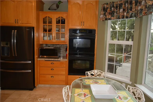 a room with furniture and a flat tv screen