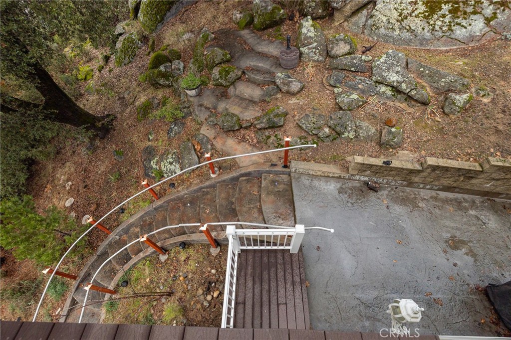 39818 Granite Ridge Lane Bass Lake, CA 93604 - Photo 44 of 58 exterior stairs off main level to garage level
