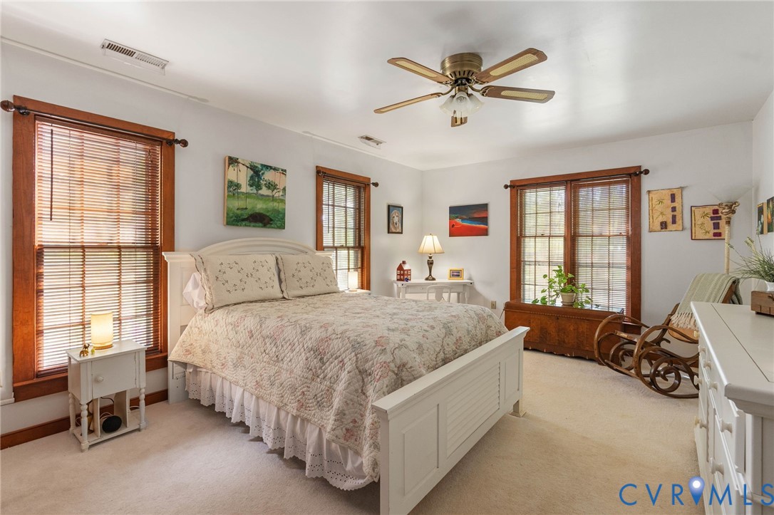 7381 McClellan Road Mechanicsville, VA 23111 - Photo 23 of 66 a bed room with a bed and a couch