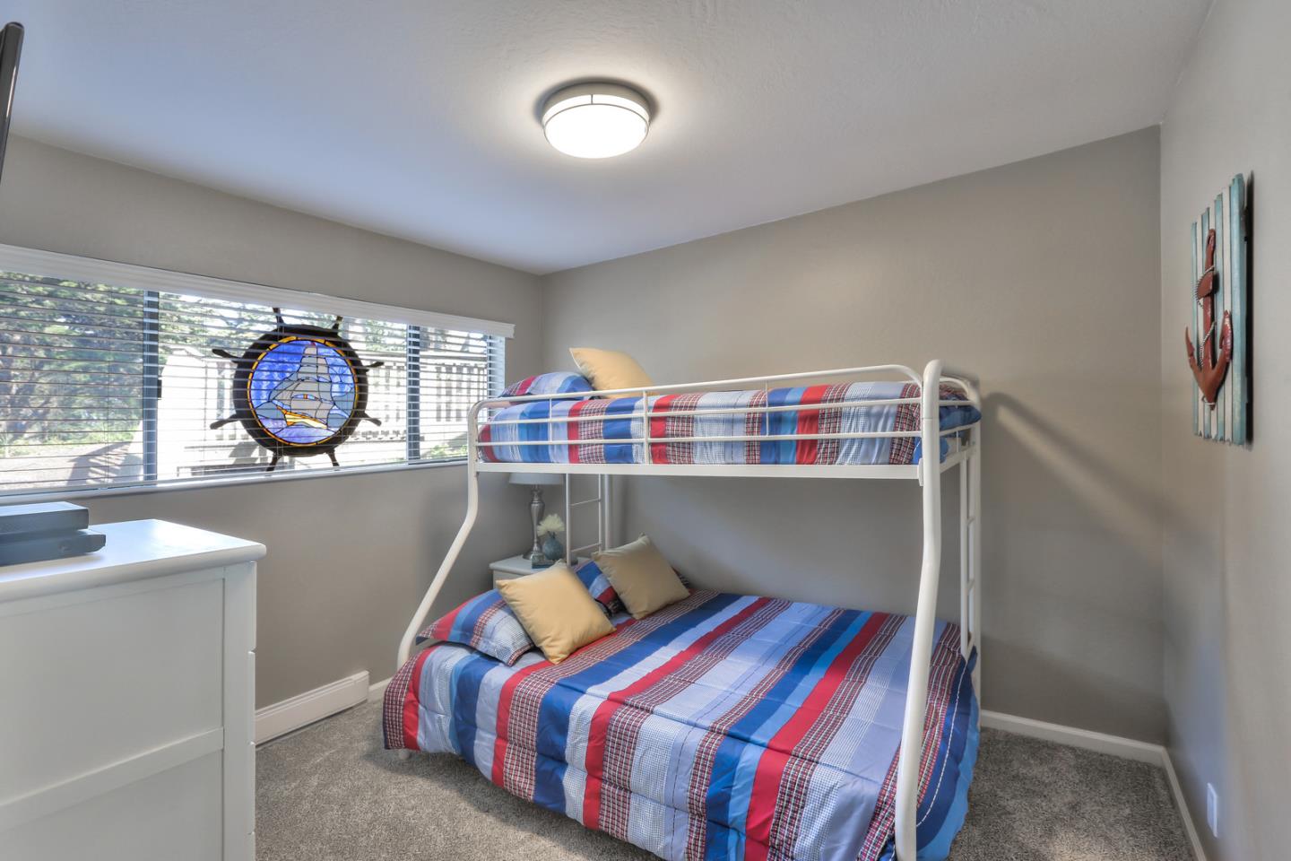 101 Shell Road, Unit 285 Watsonville, CA 95076 - Photo 14 of 27 a bed room with a bed and a window