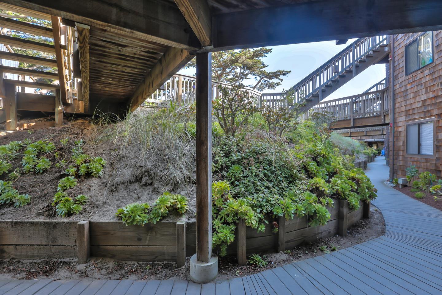 101 Shell Road, Unit 285 Watsonville, CA 95076 - Photo 19 of 27 a house with lots of trees in front of it