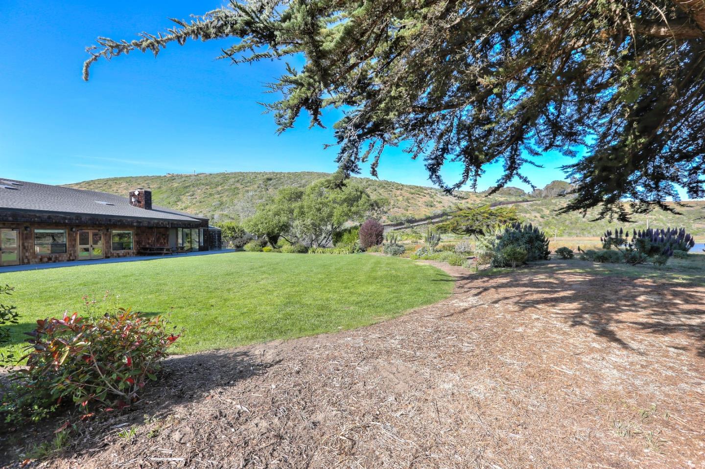 101 Shell Road, Unit 285 Watsonville, CA 95076 - Photo 26 of 27 a view of a house with a yard