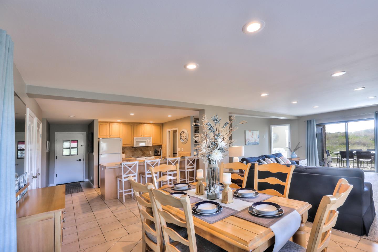 101 Shell Road, Unit 285 Watsonville, CA 95076 - Photo 5 of 27 a view of a dining area with furniture window and wooden floor