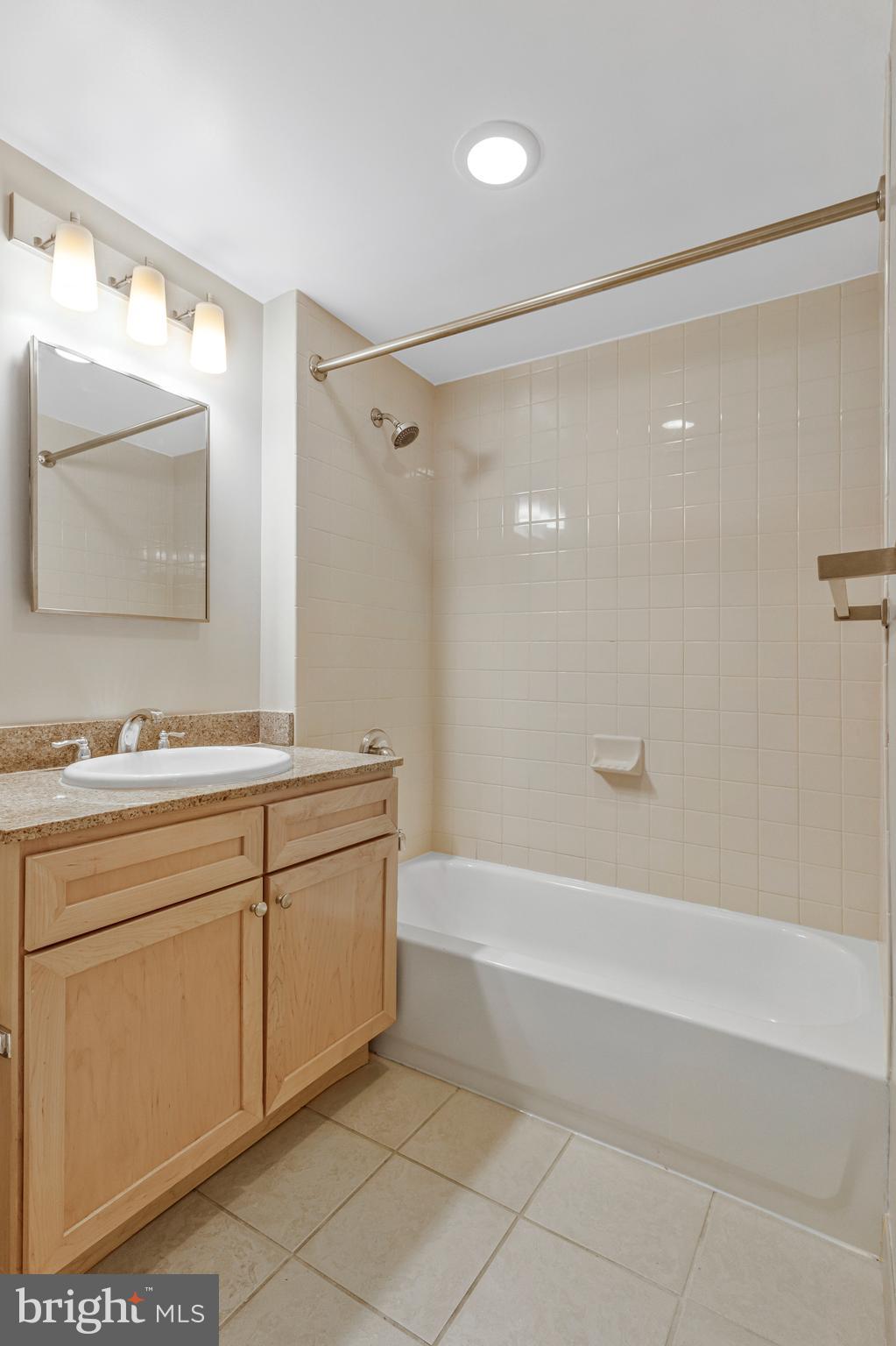 1150 K Street Northwest, Unit 1307 Washington, DC 20005 - Photo 24 of 29 a bathroom with a sink and a mirror