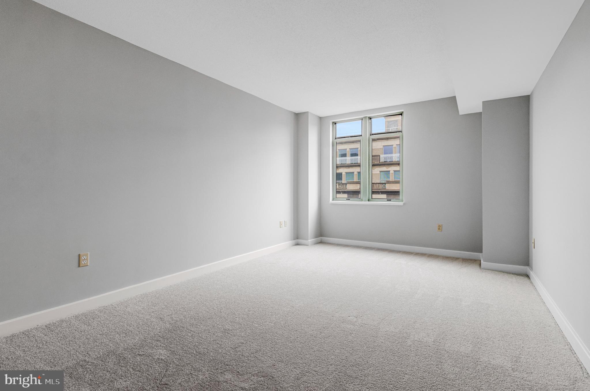 1150 K Street Northwest, Unit 1307 Washington, DC 20005 - Photo 25 of 29 a view of an empty room with a window