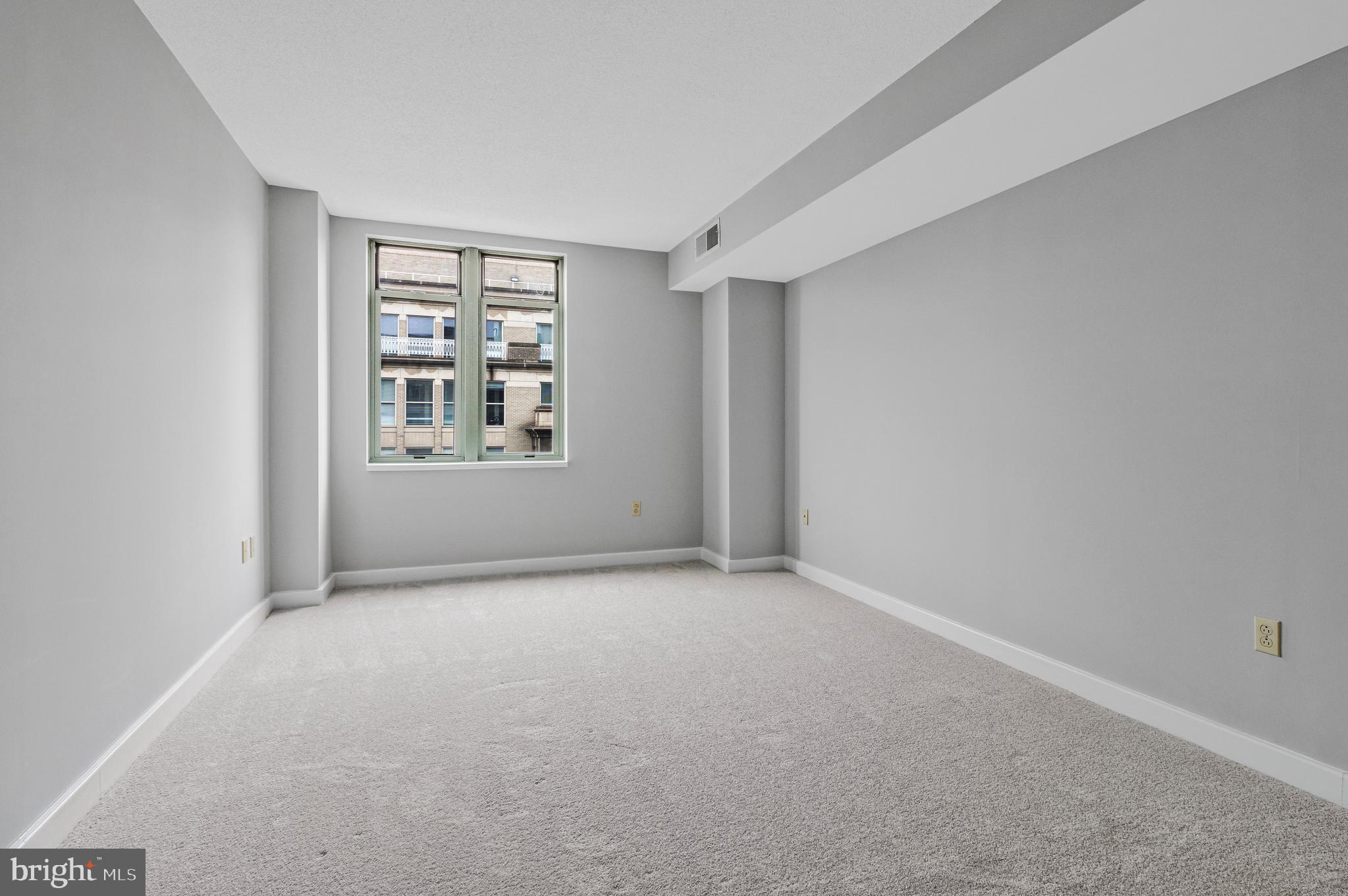 1150 K Street Northwest, Unit 1307 Washington, DC 20005 - Photo 26 of 29 a view of an empty room with a window